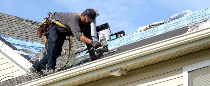 home roof repair worker